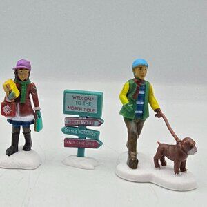 Cobblestone Corners Christmas Village People Figurines North Pole Sign Shopping